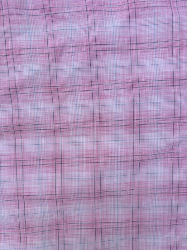 Elevate your style with our Pink Check Vest Coat Top for Women. Featuring a chic checkered pattern and a flattering fit, this versatile piece adds a touch of elegance to any outfit.