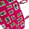 Printed pink cotton top with a sleeveless design, featuring a vibrant pattern and a relaxed fit.